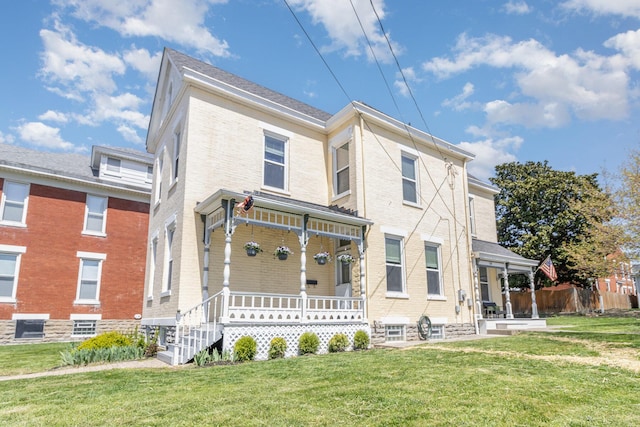 118 Electric Ave, Southgate, KY 41071 - exterior space featuring a porch, a front lawn, and brick siding