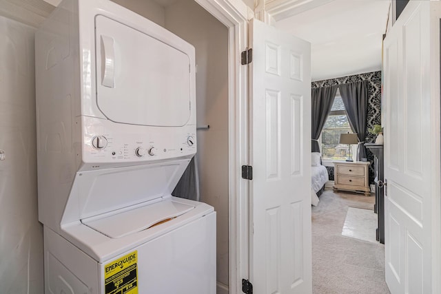 118 Electric Ave, Southgate, KY 41071 - laundry room with stacked washer and dryer, light carpet, and laundry area