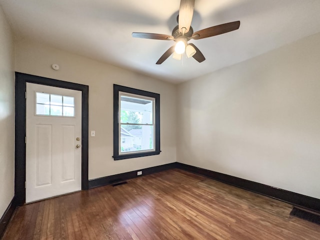 38 W 28th St, Covington, KY 41015 - entryway with ceiling fan, baseboards, and dark wood-style flooring