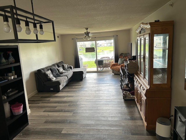 799 Slate Vw, Cold Spring, KY 41076 - living area featuring a textured ceiling, a ceiling fan, and dark wood-type flooring