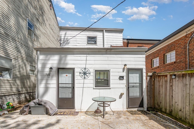 705 Bakewell St, Covington, KY 41011 - view of exterior entry featuring a patio and fence