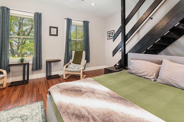 705 Bakewell St, Covington, KY 41011 - bedroom featuring baseboards, recessed lighting, and wood finished floors