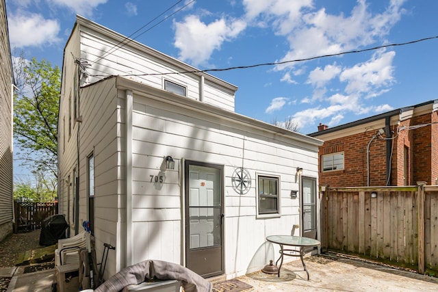 705 Bakewell St, Covington, KY 41011 - rear view of house featuring a patio and fence