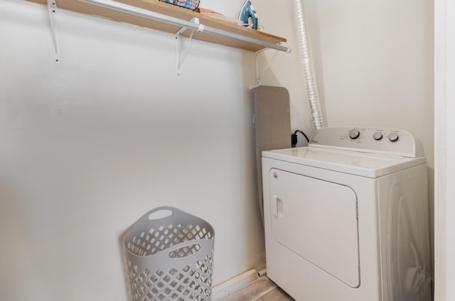 705 Bakewell St, Covington, KY 41011 - clothes washing area featuring laundry area, light wood-style flooring, and washer / clothes dryer