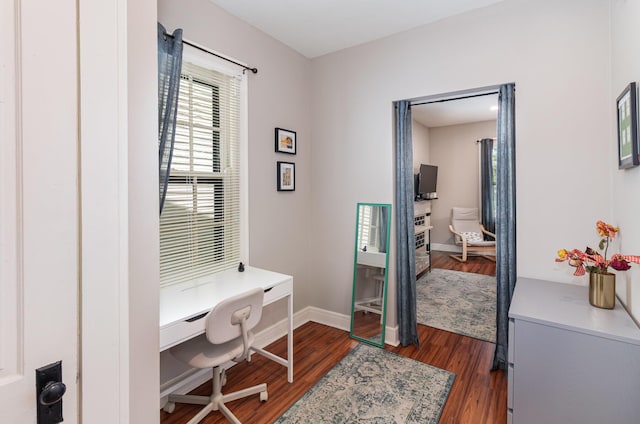 705 Bakewell St, Covington, KY 41011 - home office with baseboards and dark wood-type flooring