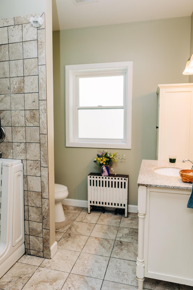 2225 Oakland Ave, Covington, KY 41015 - bathroom with toilet, baseboards, radiator heating unit, walk in shower, and vanity