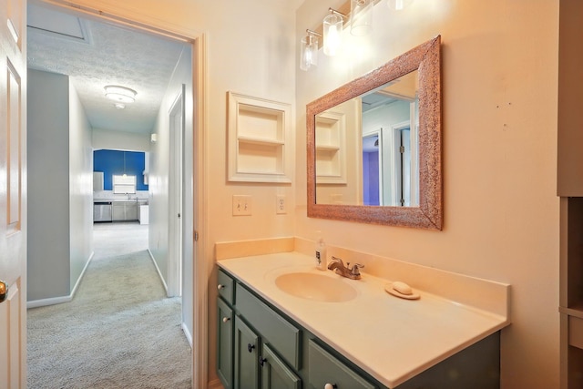 bathroom featuring vanity and baseboards