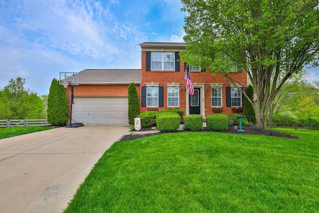 colonial house featuring fence, an attached garage, brick siding, a front yard, and driveway
