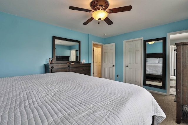 carpeted bedroom with ceiling fan