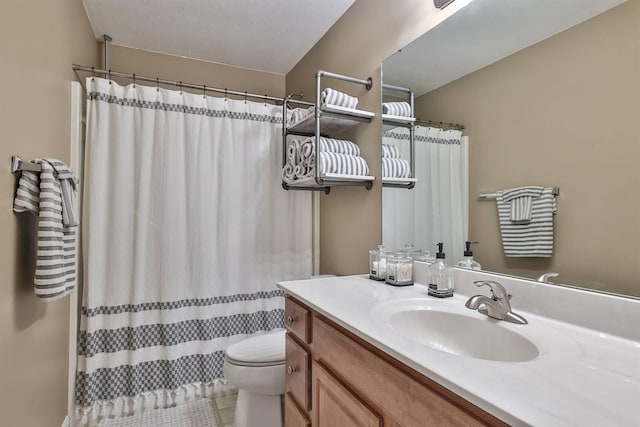 full bathroom featuring toilet, a shower with curtain, tile patterned flooring, and vanity