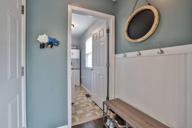 mudroom featuring baseboards