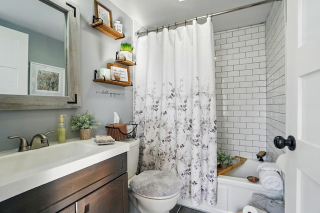 full bath with shower / tub combo with curtain, toilet, and vanity