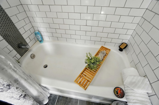 full bathroom with a washtub