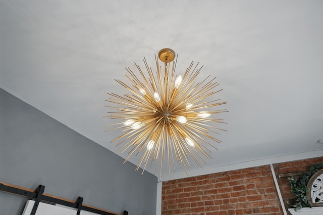 interior details featuring a chandelier