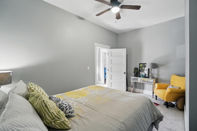 bedroom featuring ceiling fan, lofted ceiling, and carpet floors