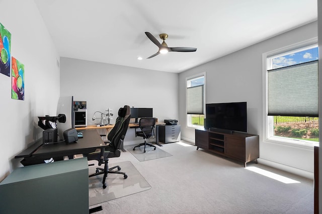 home office featuring recessed lighting, a wealth of natural light, carpet flooring, and a ceiling fan