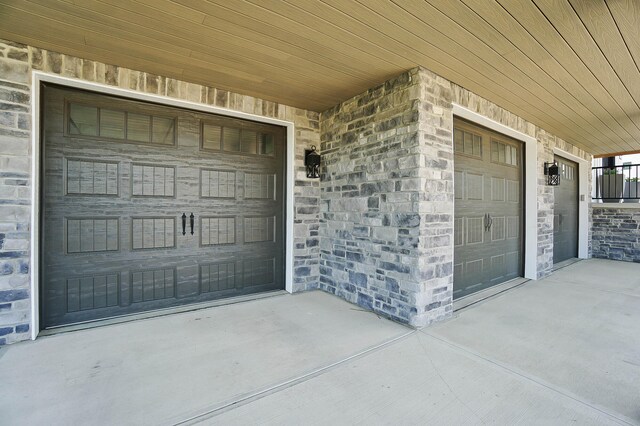 garage featuring driveway