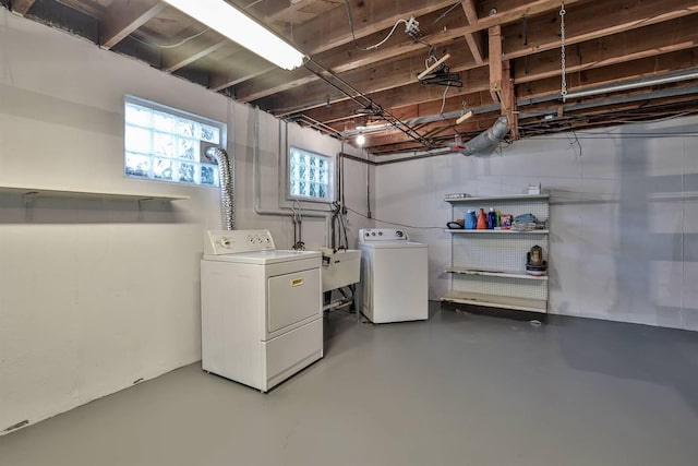 basement with washing machine and dryer
