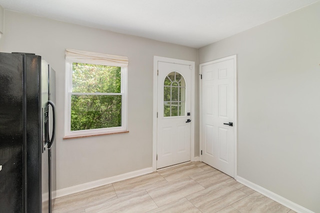 entrance foyer with baseboards