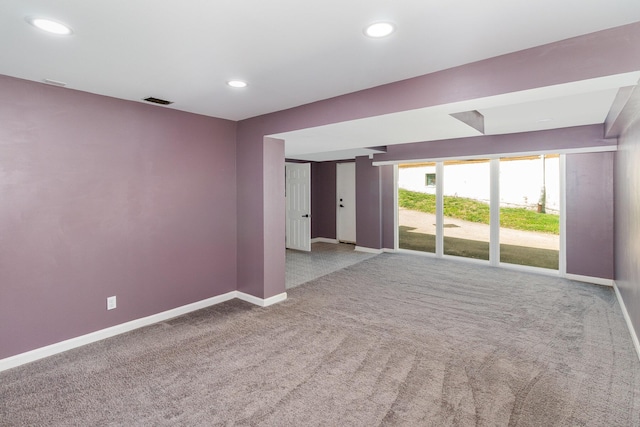 unfurnished room featuring baseboards, recessed lighting, carpet, and visible vents