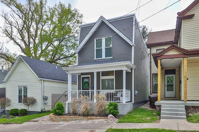 view of front of property featuring covered porch