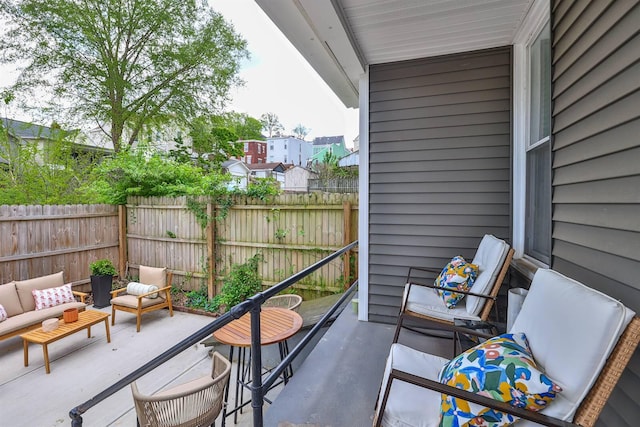 balcony featuring an outdoor hangout area and a patio