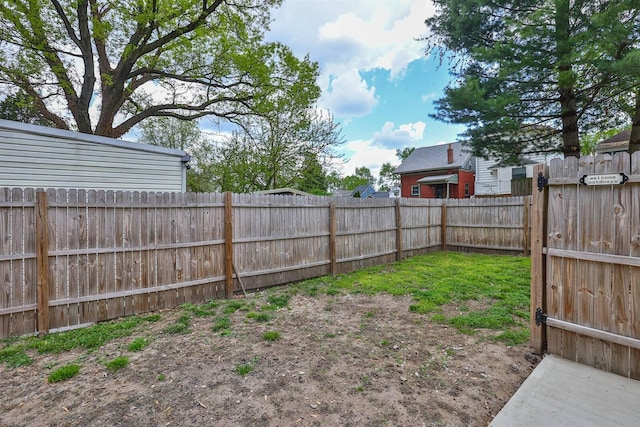 view of yard with a fenced backyard