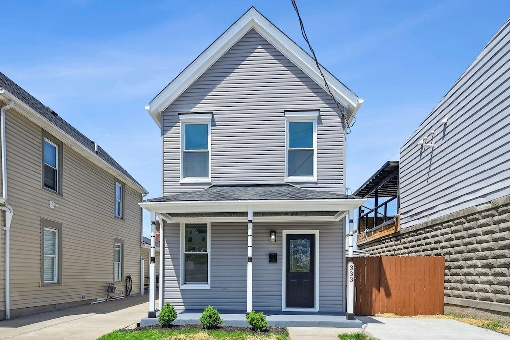 333 Union St, Bellevue, KY 41073 - traditional-style house featuring fence and covered porch