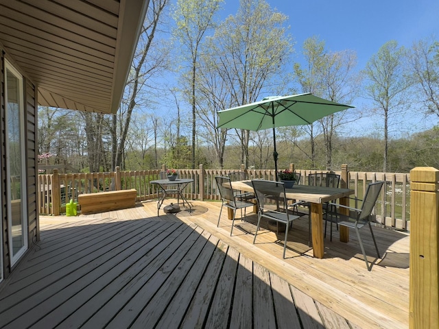 wooden deck with outdoor dining area