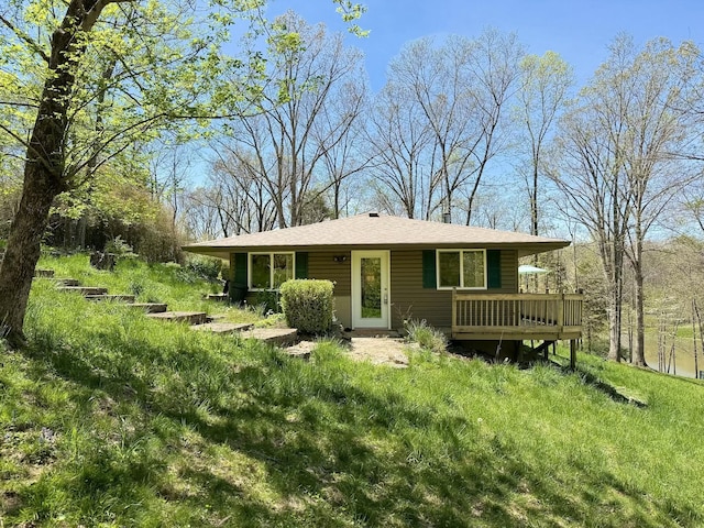 view of front of property featuring a wooden deck