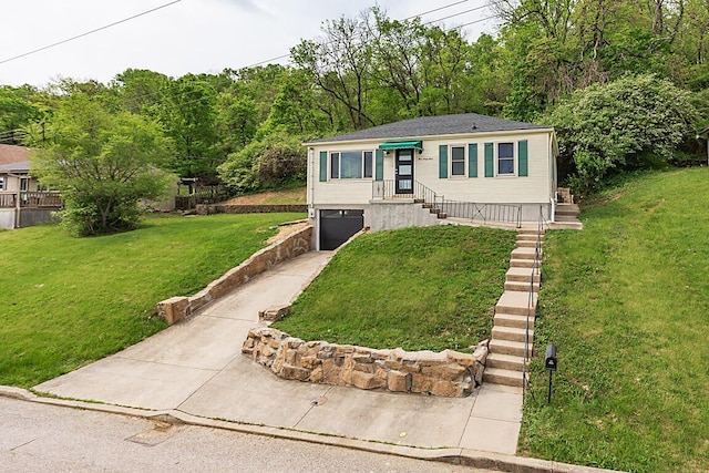 view of front of house with concrete driveway, an attached garage, and a front yard