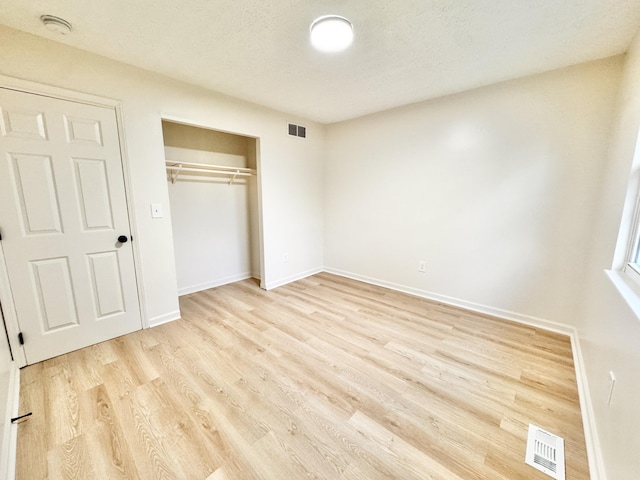 4216 Arbor Ct, Independence, KY 41051 - unfurnished bedroom featuring baseboards, light wood-style flooring, and visible vents