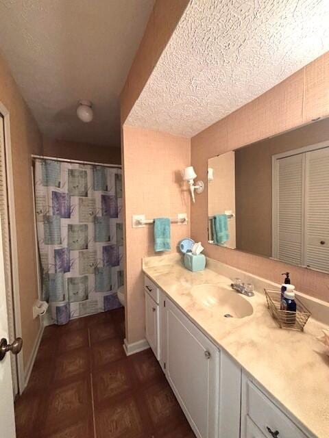 40 Fairway Ct Unit 14, Perry Park, KY 40363 - full bath with vanity, toilet, baseboards, a textured ceiling, and a shower with shower curtain