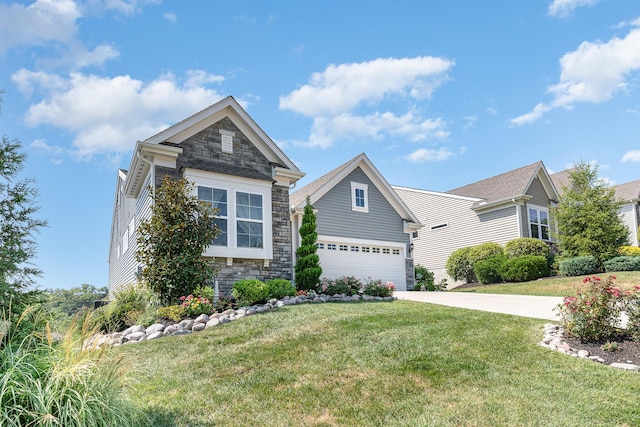 view of front of property with a front yard, stone siding, an attached garage, and concrete driveway