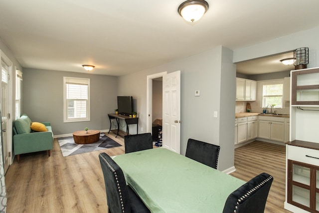 510 Fox St, Elsmere, KY 41018 - dining space featuring light wood-style flooring and baseboards