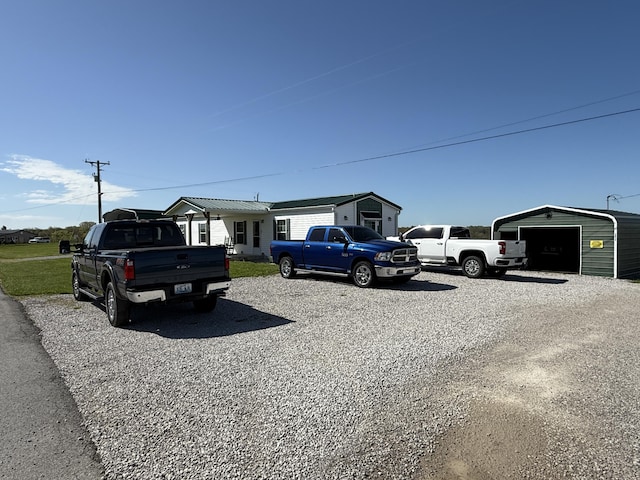 view of front of house with an outbuilding and a garage