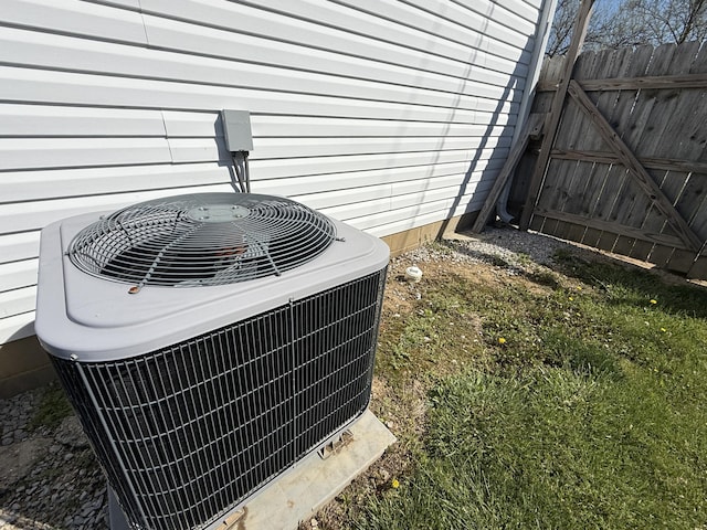 exterior details with fence and cooling unit