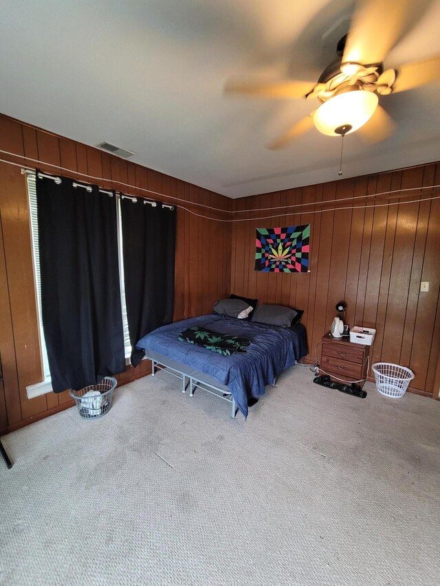 103 N Main St, Crittenden, KY 41030 - bedroom featuring carpet flooring, wooden walls, and ceiling fan