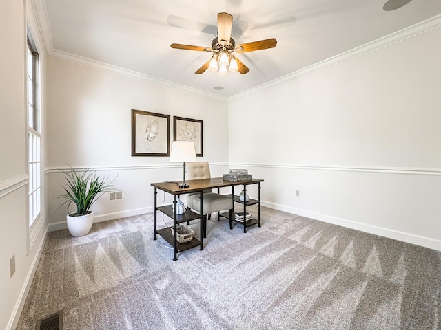 office featuring ornamental molding, a ceiling fan, carpet flooring, and visible vents