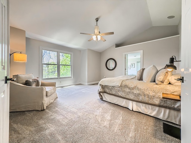bedroom featuring carpet floors, a ceiling fan, baseboards, and lofted ceiling