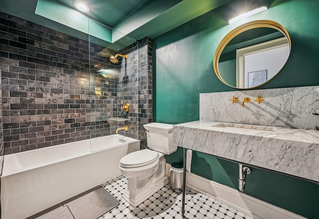full bath with toilet, shower / tub combination, and tile patterned flooring