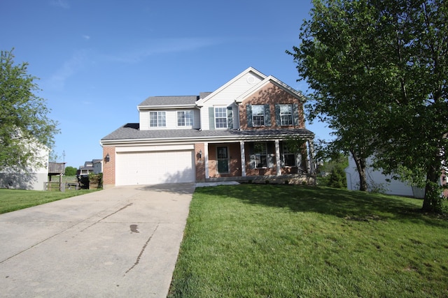 traditional-style house featuring a garage, a front lawn, brick siding, a porch, and driveway