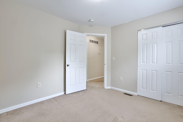 1609 Woodfield Ct, Hebron, KY 41048 - unfurnished bedroom featuring light carpet and a closet