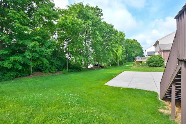 1609 Woodfield Ct, Hebron, KY 41048 - view of green lawn with a patio and stairway