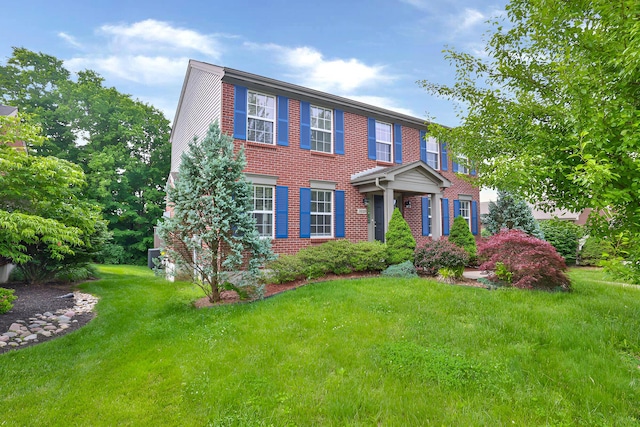 1609 Woodfield Ct, Hebron, KY 41048 - colonial house with brick siding and a front lawn