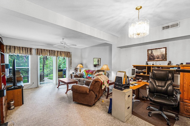 home office featuring carpet, a ceiling fan, and a chandelier