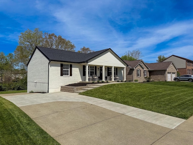 ranch-style home featuring a porch and a front lawn