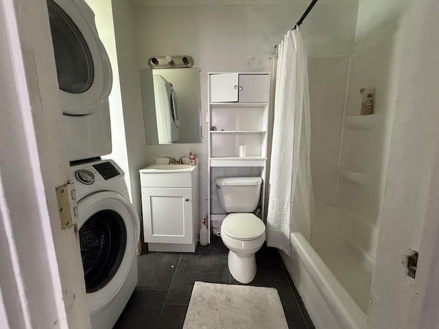 2749 Alexandria Ave, Covington, KY 41015 - full bath with toilet, stacked washer / drying machine, tile patterned flooring, and vanity