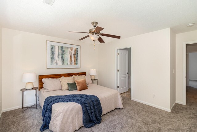 bedroom featuring baseboards, carpet, and visible vents