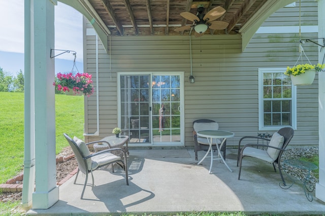 view of patio featuring a ceiling fan